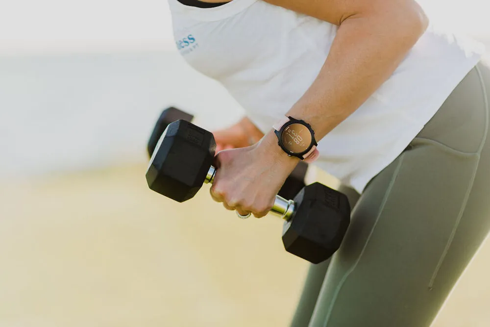 Close-up of dumbbells during a strength session